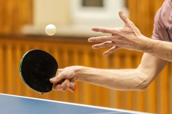 table tennis player forehand smash